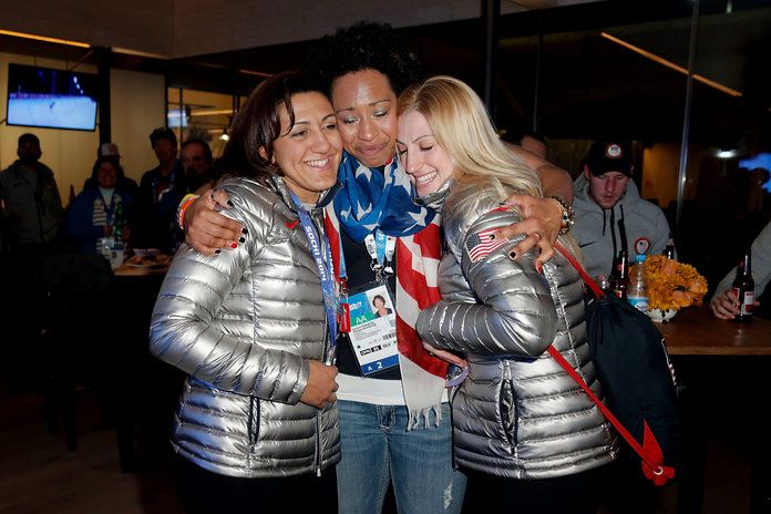 لنا. Olympians Elana Meyers, Jazmine Fenlator and Jamie Greubel visit the USA House in the Olympic Village on February 20, 2014 in Sochi, Russia
