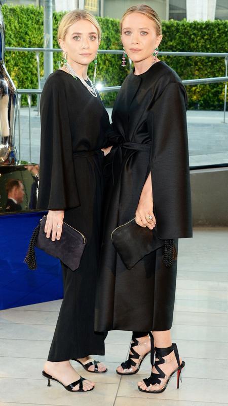 اشلي Olsen and Mary-Kate Olsen attend the 2014 CFDA fashion awards