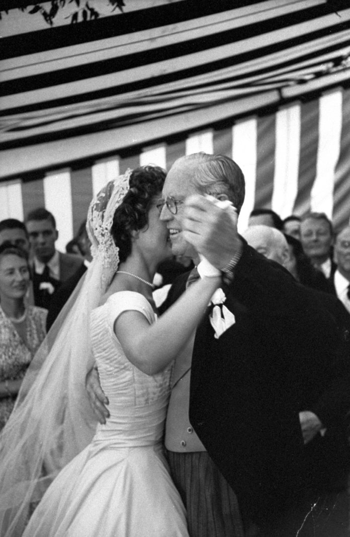 ال groom's father dancing with Jackie Kennedy 