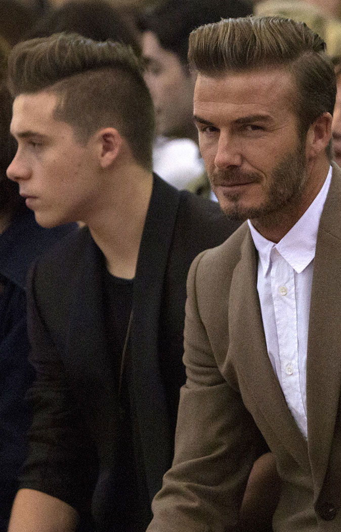 ديفيد and Brooklyn Beckham front row at Victoria Beckham S/S16 show