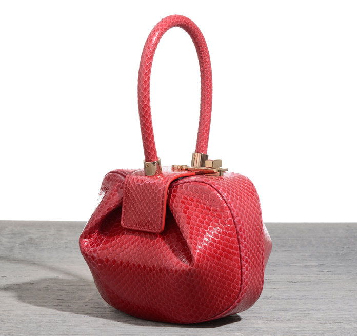 ديمي bag in red snake, $2,495; at Net-a-porter.com. 
