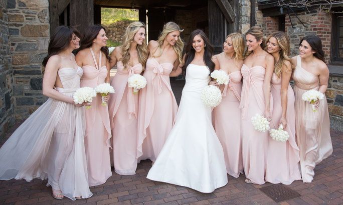 Александра (in Carolina Herrera from Mark Ingram Bridal) chose to dress her maids of honor (her sisters) in Rose Quartz gowns by Maria Lucia Hohan and her bridesmaids in Jenny Yoo